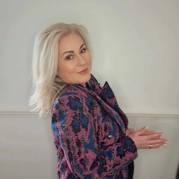 Voluminous Icy Blonde Blowout with Crown Lift