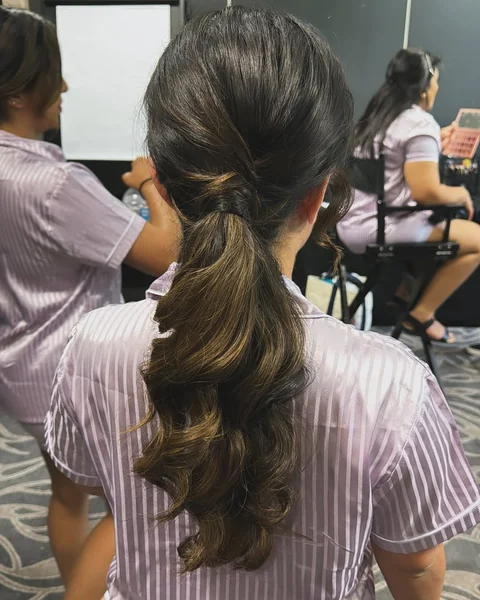 Voluminous Twisted Low Ponytail for Bridesmaids