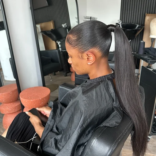 Wet-Look Low Ponytail with Rich Hollywood Waves