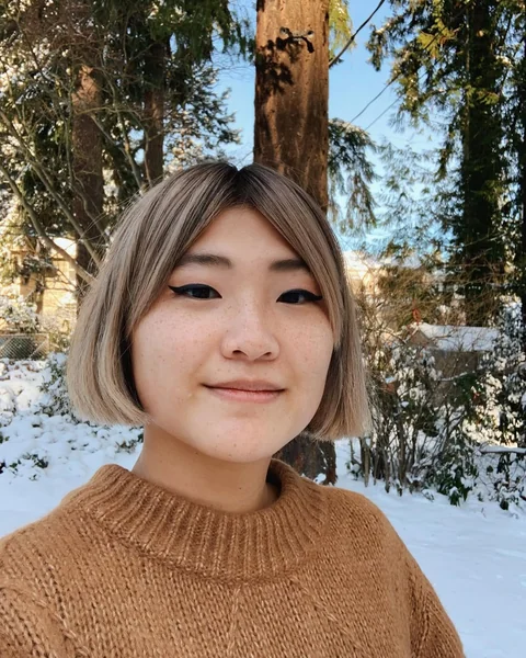 Modern Minimalist Blunt Micro Bob in Ash Blonde