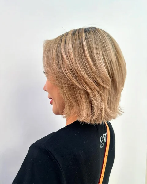Feathered Caramel Bob with Sweeping Layers