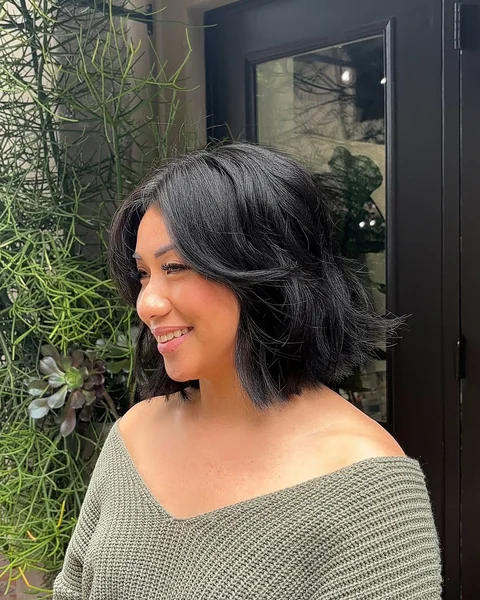 Voluminous Raven Bob with Flicked Layers