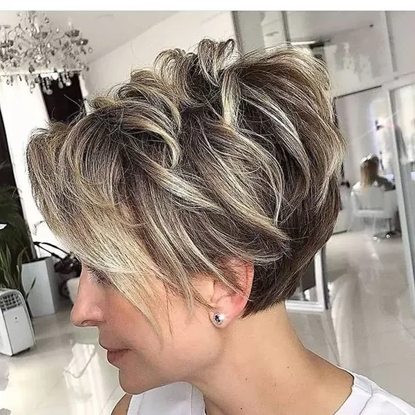 Voluminous Layered Pixie with Dimensional Blonde Highlights