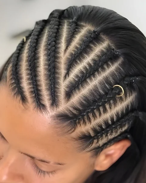 Artistic Geometric Cornrows with Gold Ring Accents