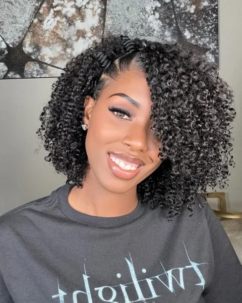 Braid-Accented Curly Bob with Sleek Side Detail