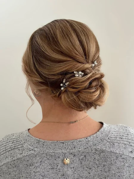 Braided Floral Bun with Lush Rose Garland