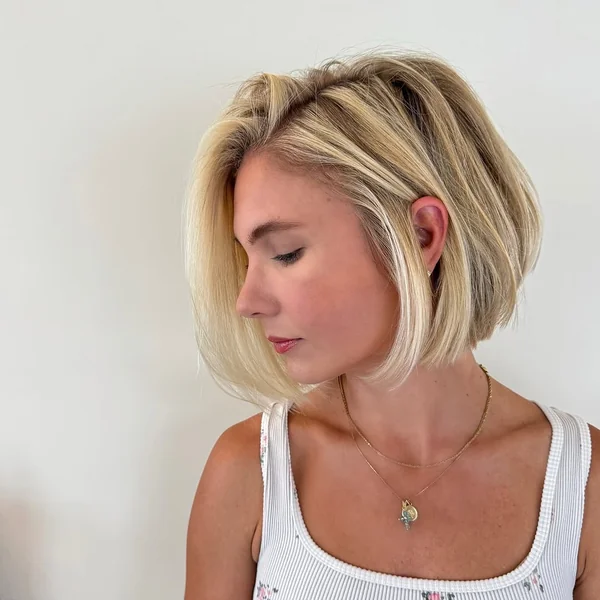 Chic Sun-Kissed Bob with Airy Tucked Layers