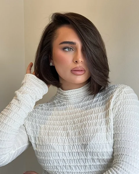 Chic Textured Blonde Bob with Soft Curtain Bangs