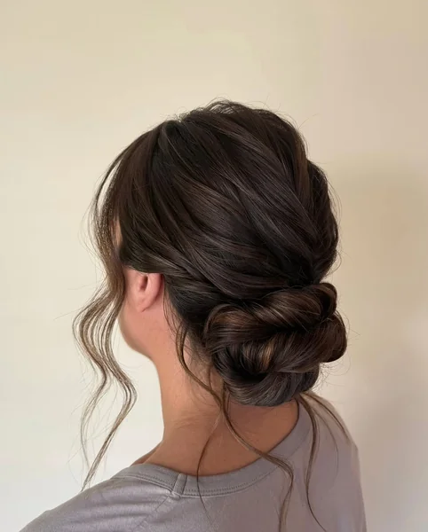 Chic Textured Low Chignon with Face-Framing Wisps