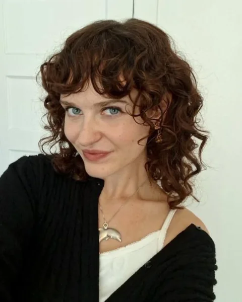 Curly French Shag with Bottleneck Bangs