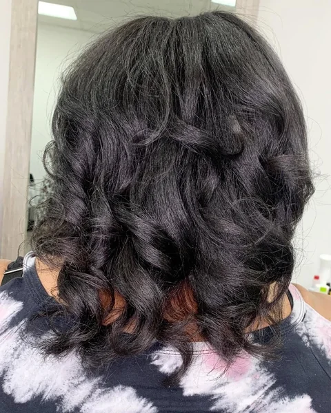 Edgy Chestnut Wolf Cut with Shaggy Face-Framing Layers