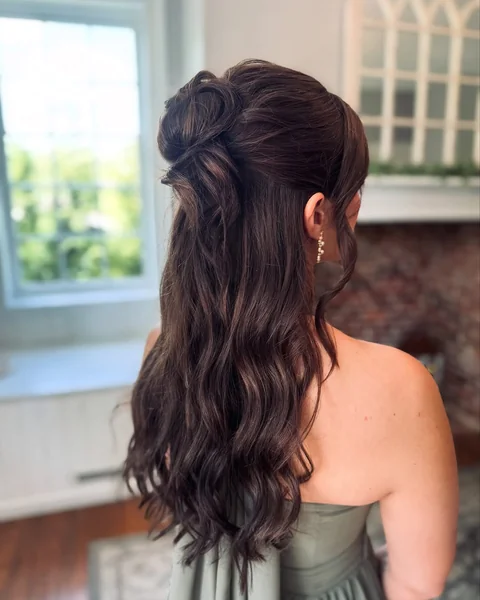 Elegant Half-Up Twisted Bun with Romantic Face-Framing Bangs