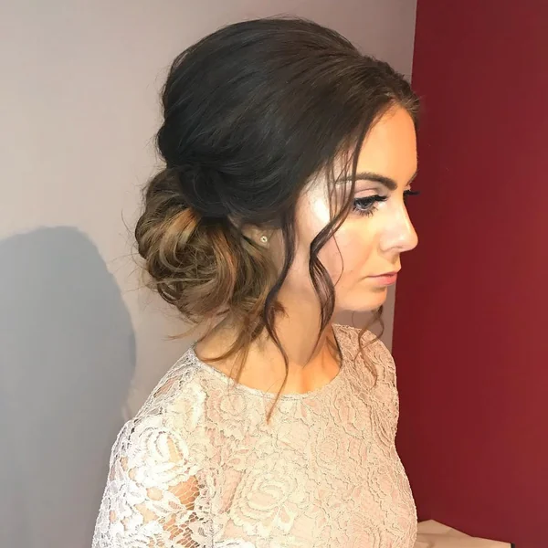 Elegant Side-Swept Messy Bun for Formal Nights