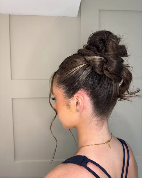 Elegant Twisted Low Bun for Dimensional Highlights