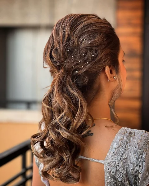 Elegant Voluminous Ponytail with Romantic Ribbon Curls
