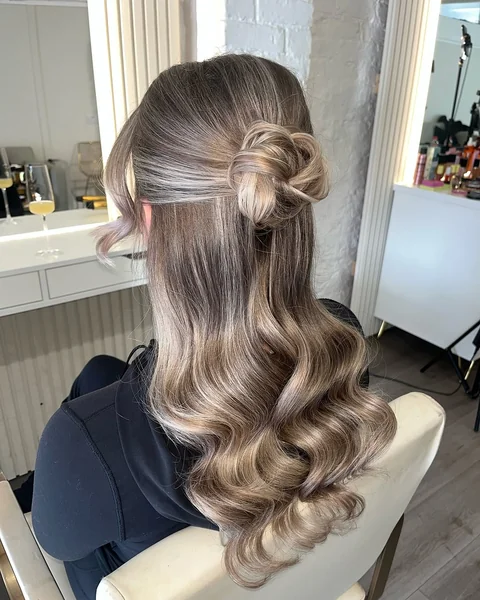 Half-Up Rosette Bun with Cascading Glamour Waves
