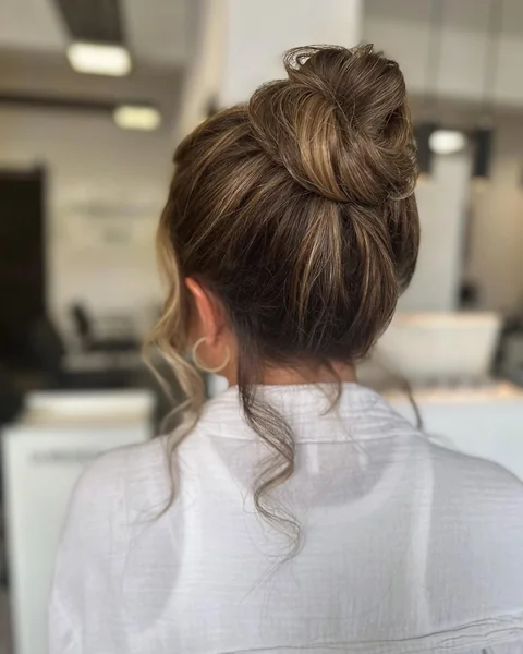 High Glamour Bun with Voluminous Ringlet Crown
