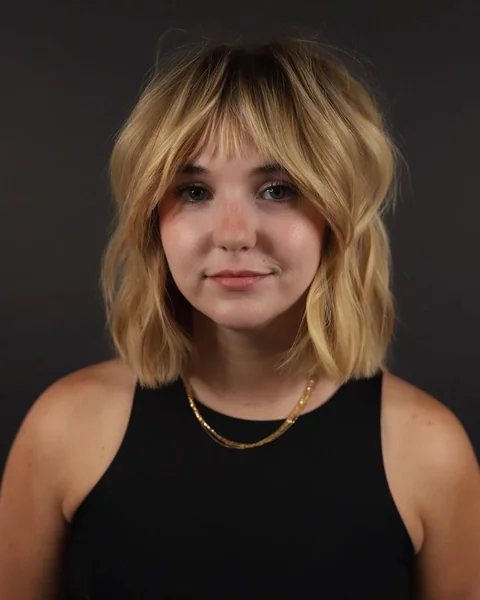 Honey Blonde Textured Shag with Wispy Bangs