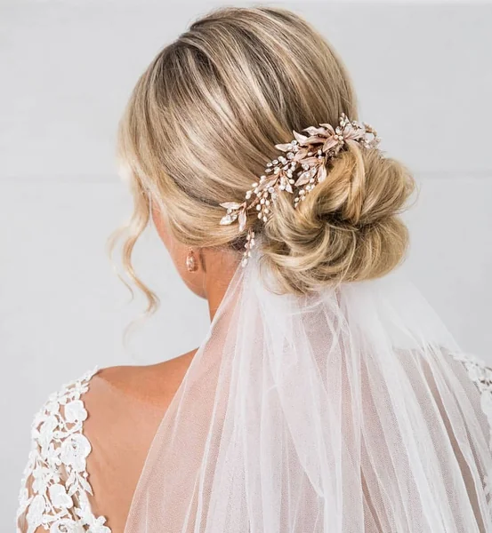 Messy Textured Low Bun with Delicate Crystal Sprigs
