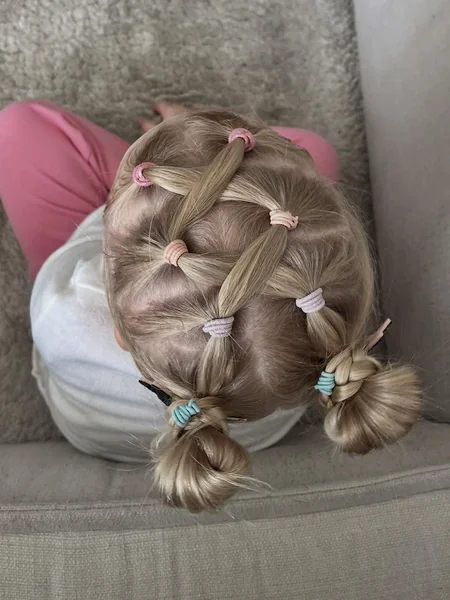 Playful Criss-Cross Sectioned Low Space Buns
