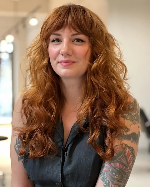Radiant Copper Shag with Feathery Sun-Kissed Bangs