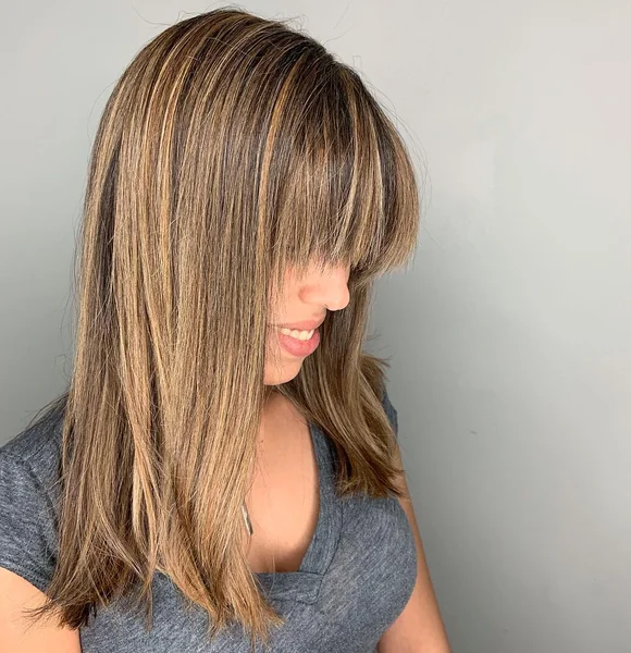 Sleek Sun-Kissed Lob with Full Wispy Bangs