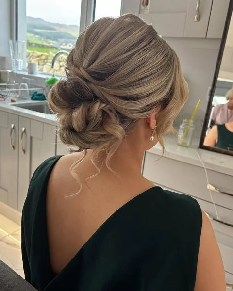 Soft Ash Blonde Chignon with Elegant Overlapping Layers