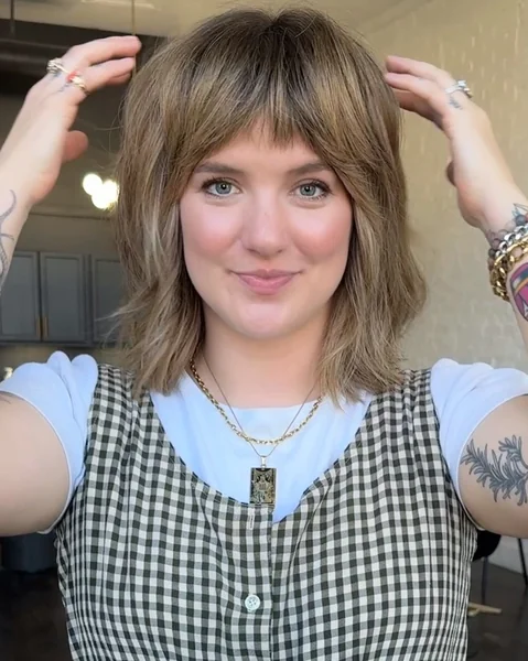 Textured Bronde Wolf Cut with Airy Curtain Bangs