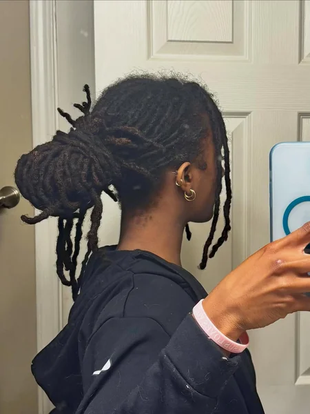 Textured Loc Bun with Face-Framing Tendrils