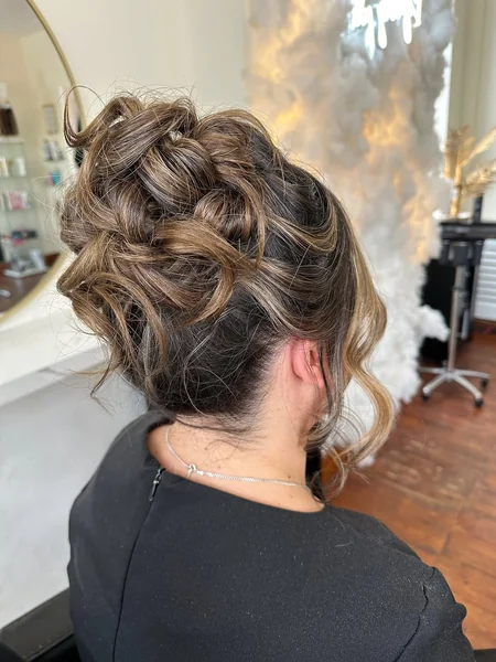 Texturized Caramel Highlighted Messy Bun with Height