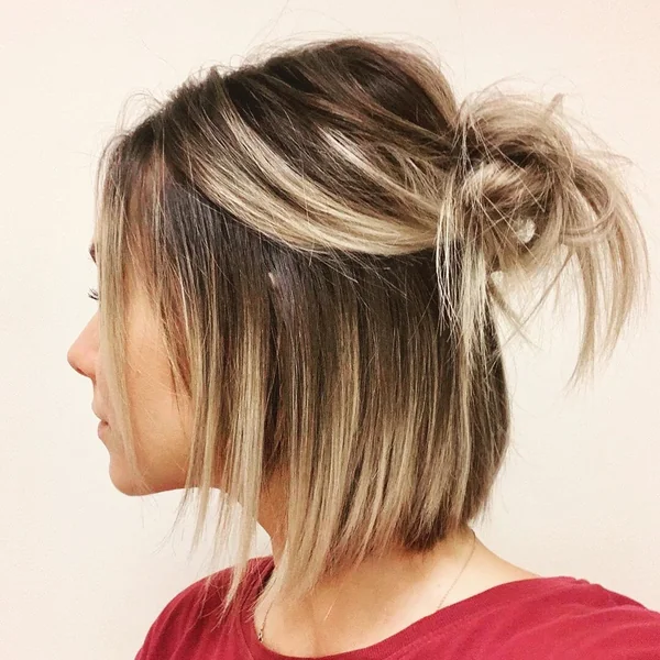 Trendy Half-Up Top Knot for Short Highlighted Hair