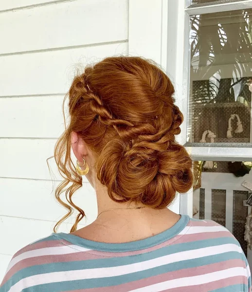 Twisted Auburn Low Bun with Rope Braids