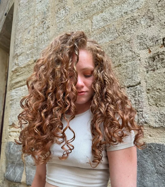 Voluminous Chestnut Shag with Soft Face-Framing Layers