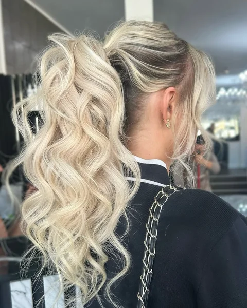 Effortless High Ponytail with Beachy Blonde Waves