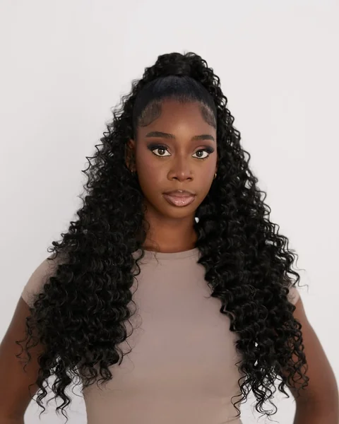 Glamorous High Half-Up Ponytail with Full Curls