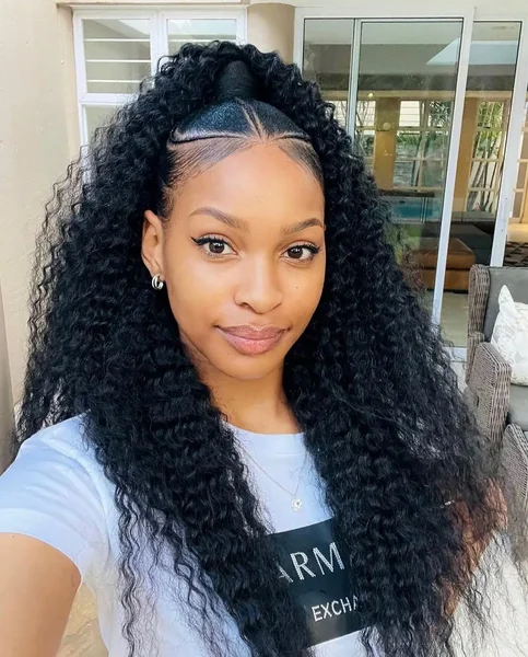 High Curly Ponytail with Sleek Defined Center Part