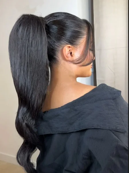 High-Gloss Dark Ponytail with Flipped Ends