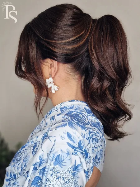 Stunning Auburn Low Ponytail with Soft Waves