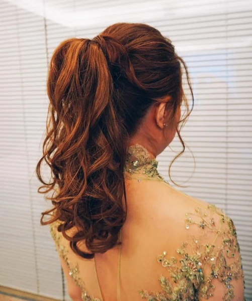 Voluminous Copper Ponytail with Romantic Bridal Curls