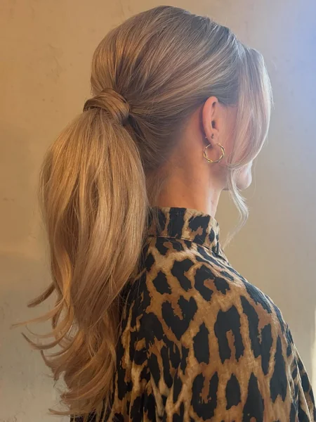 Voluminous Wavy Dark Barbie Ponytail with Curtain Bangs