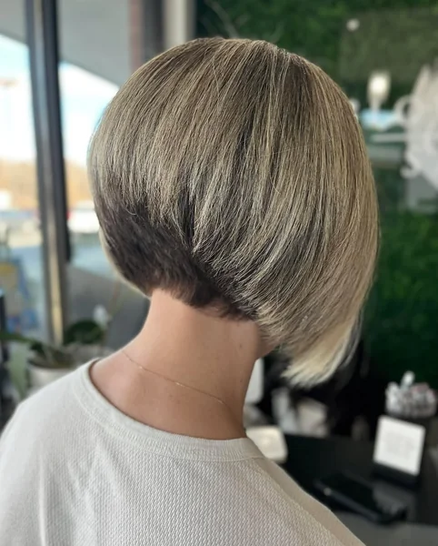 Chic Sun-Kissed Stacked Bob with Tapered Nape