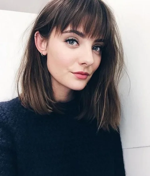Classic Brunette Midi-Cut with Soft Feathery Bangs