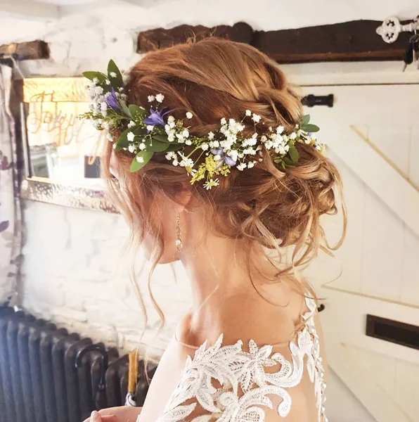 Ethereal Boho Low Bun with Wispy Face-Framing Bangs