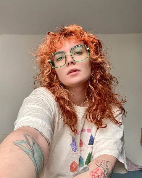 Fiery Copper Curly Wolf Cut with Full Fringe