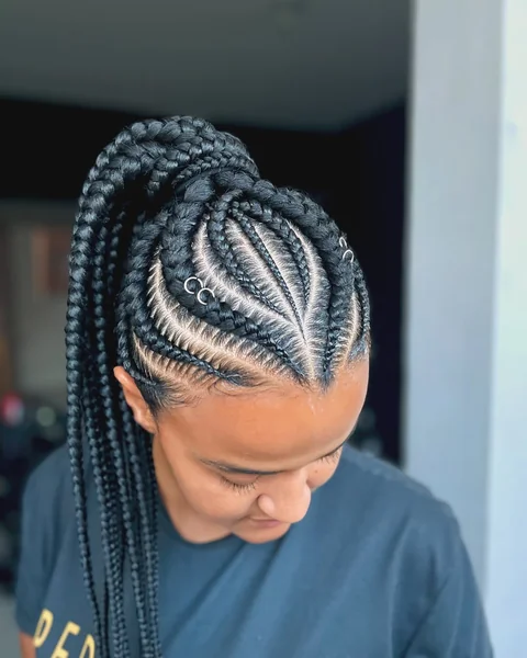 Intricate Fulani High Ponytail with Silver Ring Charms