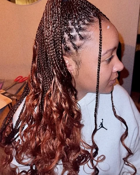 Radiant Copper Micro Braids with High-Volume Curls