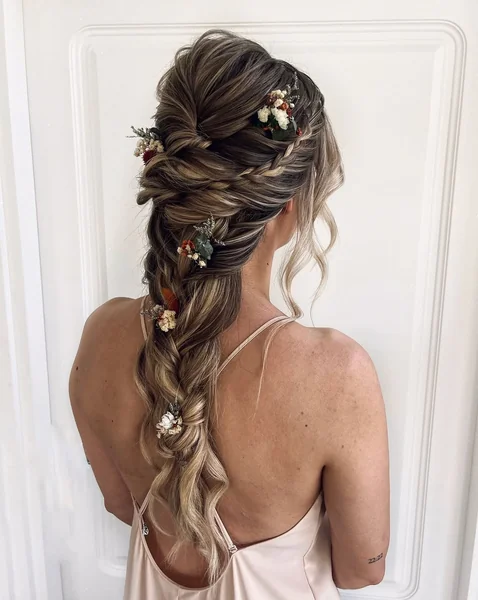 Romantic Floral Tucked Braid with Soft Face-Framing Tendrils