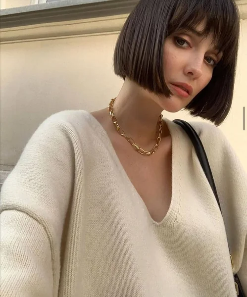 Sleek Espresso French Bob with Eye-Grazing Bangs