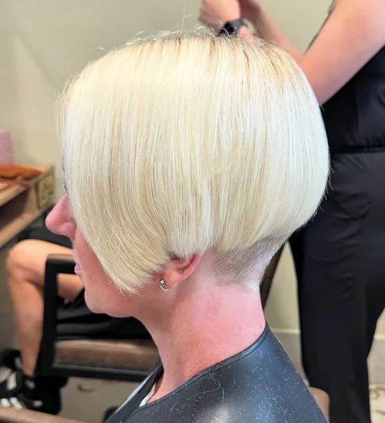 Sleek Honey-Bronde Blunt Bob with Subtle Highlights