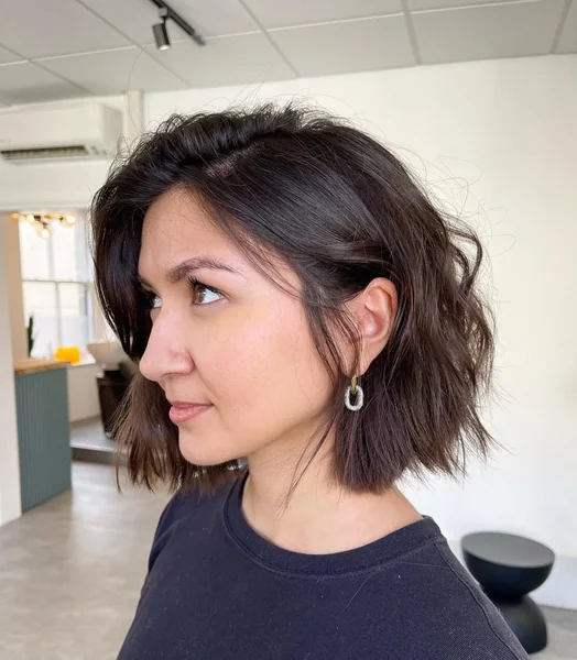 Textured Brunette Italian Bob with Tousled Waves